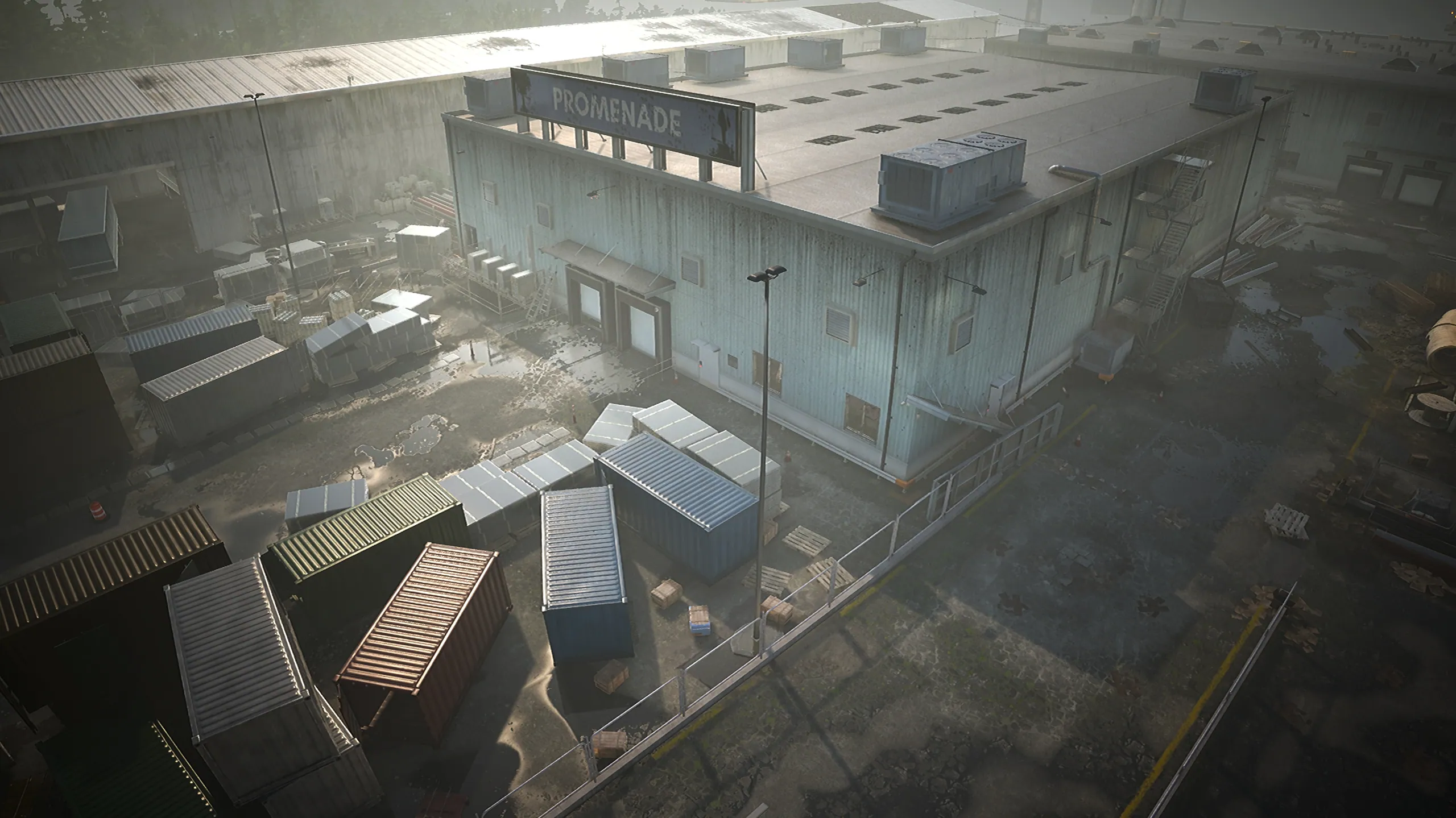 Aerial view of the Promenade warehouse surrounded by shipping containers