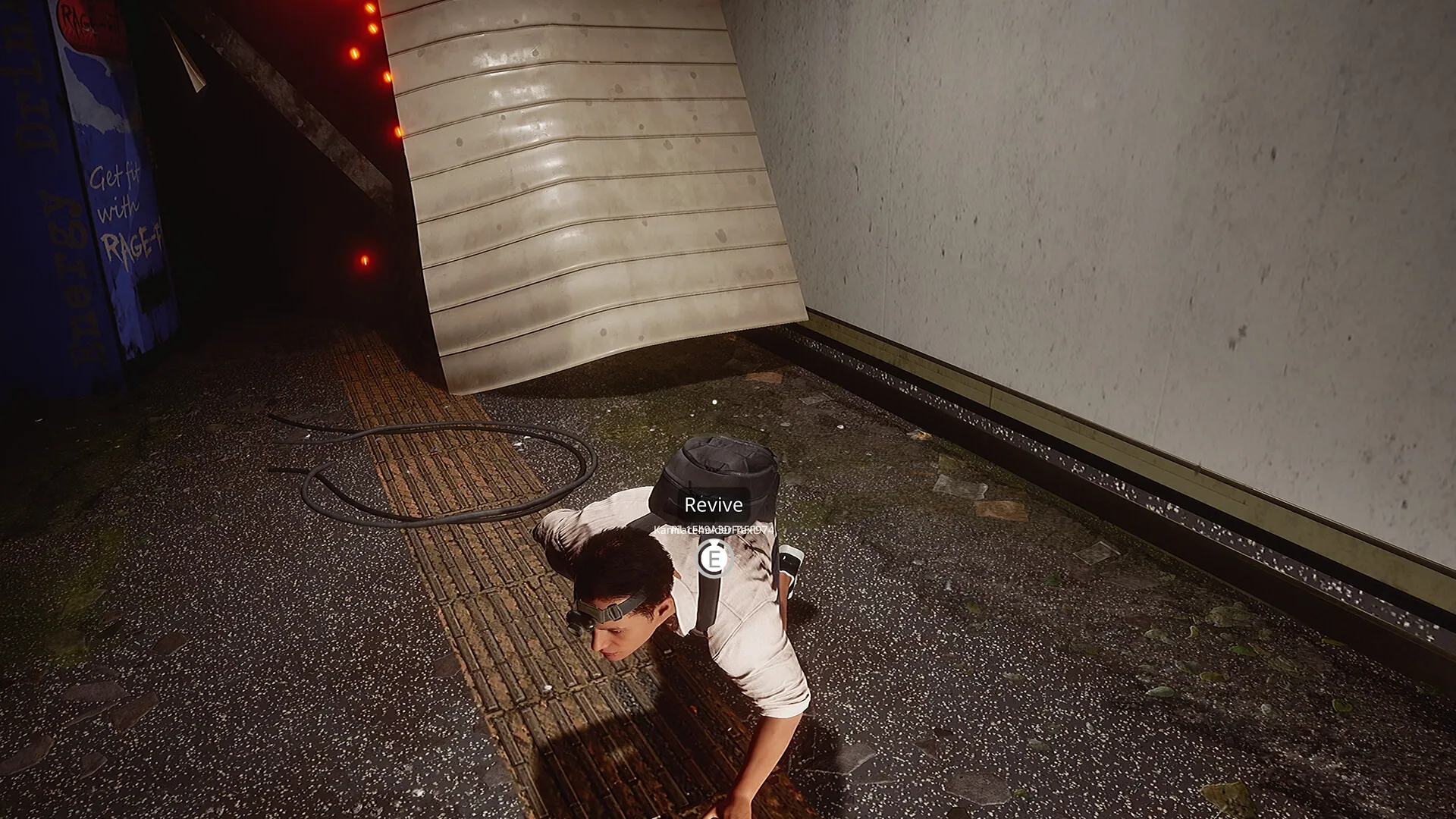 A player reviving a downed teammate on the subway tracks
